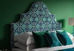 Blue Green Linwood Kami Velvet Seagrass on a curved ornate headboard