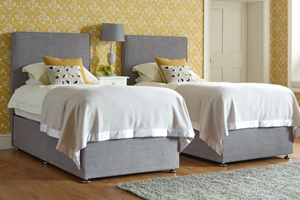 The Clever and Practical Coll Zip & Link Bed with removable cover, covered in House Weave Light Grey